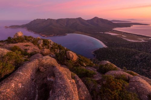 View of Wineglass Bay from Mount Amos at sunset mount Amos, freycinet, tasmania, wineglass bay