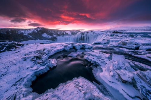 Iceland looking truly the land of fire and ice with sunrise at Godafoss Godafoss, winter, Iceland