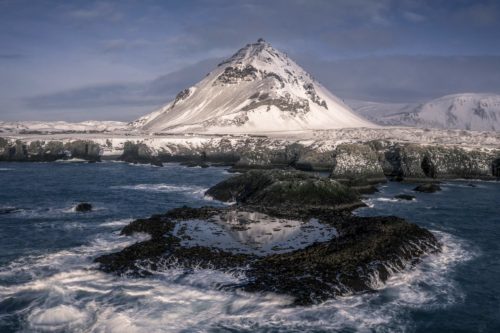 Catching reflections from the drone Anarstapi, Iceland, winter