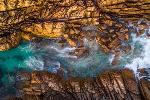 Water flow and waterfall through a mini canyon in southwest Western Australia Injidup, Western Australia, natural springs