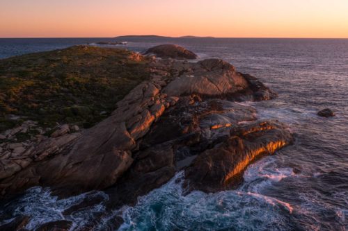 Sunset over a tiny uninhabited island off the Esperance coast Esperance, Western Australia