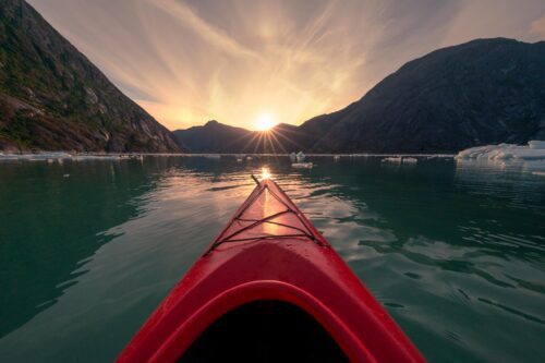 Kayaking a bay of a thousand icebergs in remote Alaska at a location only accessible by boat Alaska, kayak