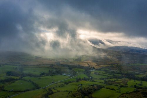 Fog flows over the Welsh countryside Wales