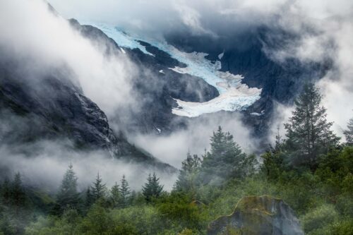Fog drifts around the mountains and glaciers of Alaska Alaska, Petersburg