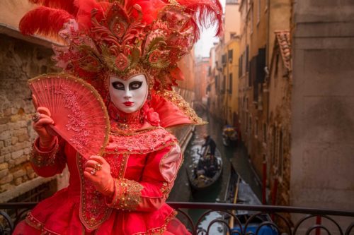 Sophie at a quiet canal in 2019 Carnevale, Venice, Venezia