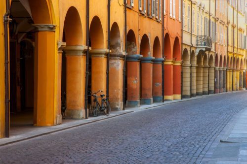 The coloured facades and arcades of Modena Modena, Emilia-Romagna, Italy
