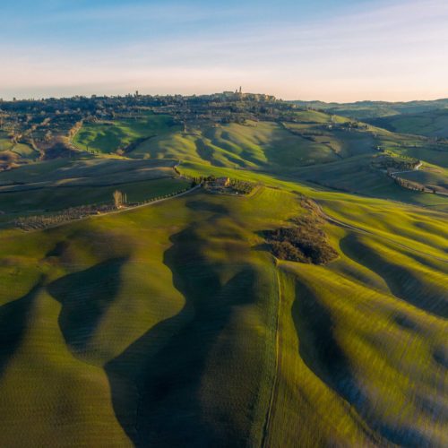 The town of Pienza sits atop the rolling hills of the Val d'Orcia in Tuscany Val d'Orcia, pienza, Toscana, Tuscany, Italy