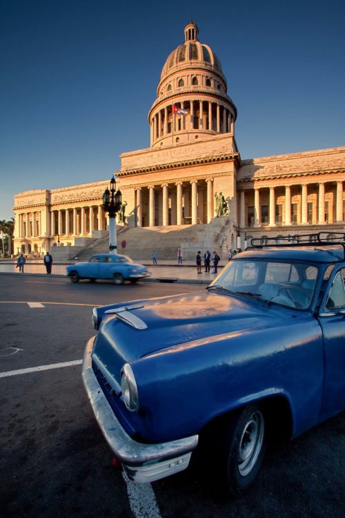 The Capitolio building reflected onto the bonnet of a 53 Mercury 1953 Mercury, Cuba, Havana, Capitolio