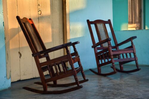 The ubiquitous rocking chairs on the porch of a home in the town of Vinales Vinales, rocking chairs, Cuba