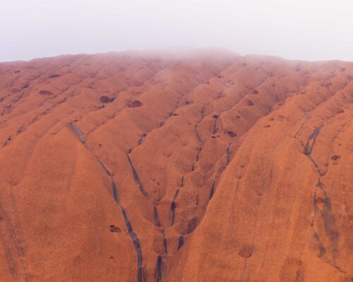 Low lying cloud atop Uluru Uluru, fog, Kata tjuta NP, Northern Territory, Ayers Rock