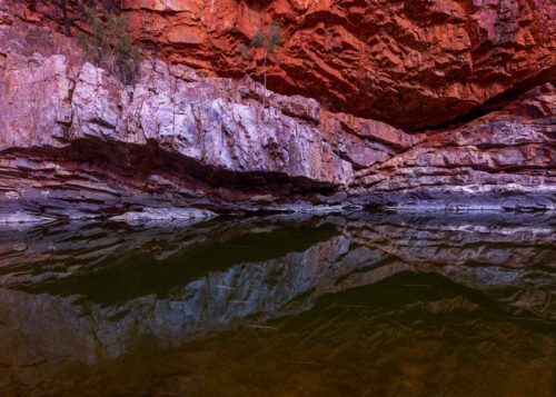 The still waters in Ormiston gorge on a long exposure during one evening Ormiston Gorge, Northern Territory