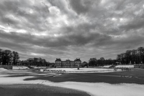 An empty Jardin du Luxembourg under fresh snow Jardin du Luxembourg, winter, snow, black and white, Paris