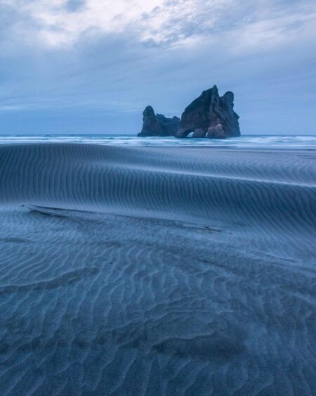 The ever changing sand patterns of Wharariki beach New Zealand, Wharariki beach