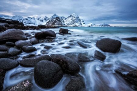Soft early morning light on the twin peaks of Lofoten Lofoten, Vareid, Norway