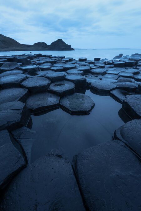 The geometric patterns of the basalt columns of the giant's Causeway Giant's Causeway, Northern Ireland