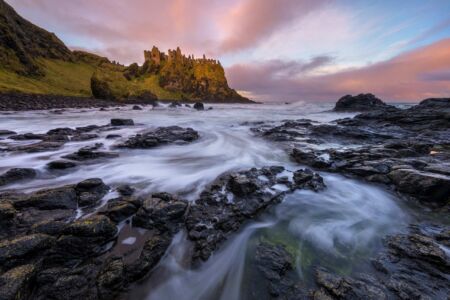 Sunrise making Dunluce Castle glow Dunluce Castle, Northern Ireland, Co Antrim,