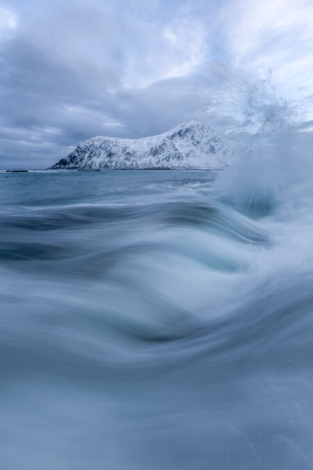 Some explosive water action at Skagsanden beach at sunrise Skagsanden Beach, Lofoten, Norway