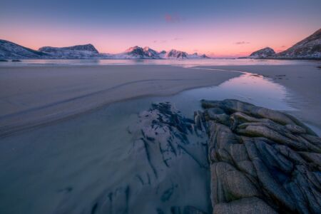 Sunrise at the popular Haukland beach Haukland Beach, Lofoten, Norway