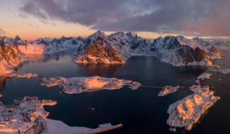 Panoramic view on a stunning sunrise over the towns of Reine and Hamnoy in Lofoten Hamnoy, Reine, Norway, Lofoten