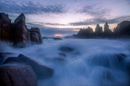 Getting smashed by a solid swell at high tide on Phillip Island Phillip Island, Cape Woolamai, Victoria