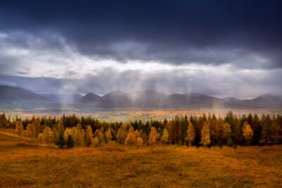 Rain showers touched by the light in the Scottish Highlands Glen Shiel, Scottish Highlands, Scotland