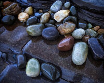 The beautiful multicoloured polished boulders of Elgol beach Elgol, Isle of Skye, Scotland